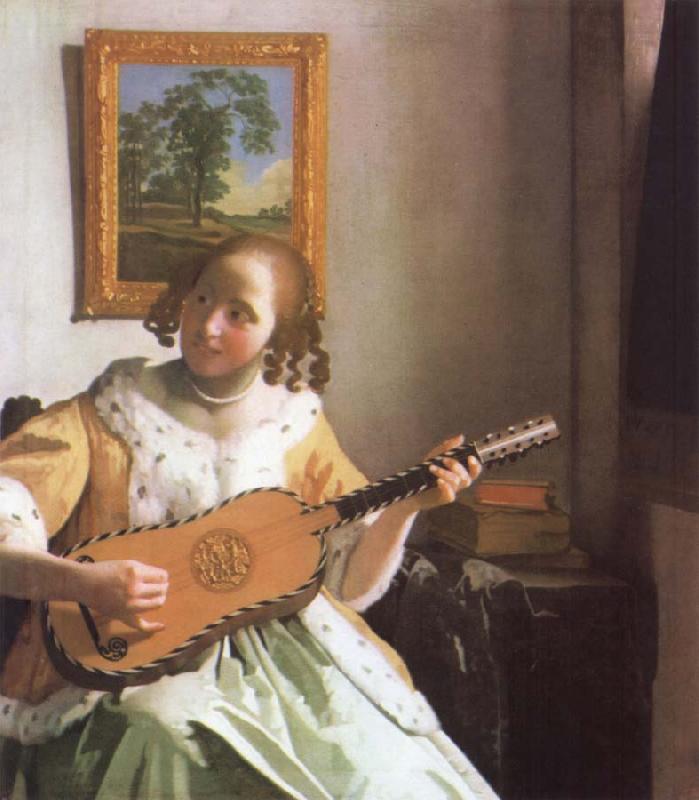 Jan Vermeer Woman is playing Guitar